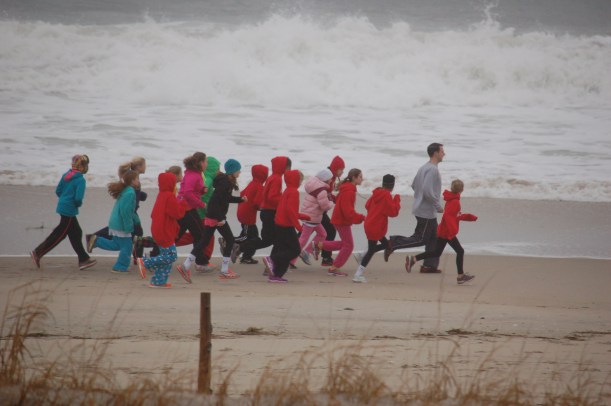 Redshirts running the beach