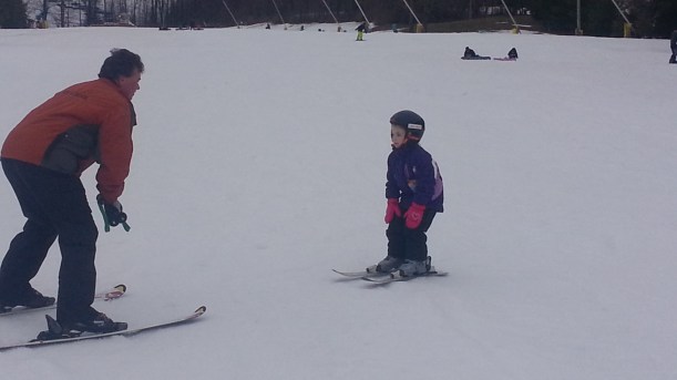 Maggie - hands on her knees, no poles